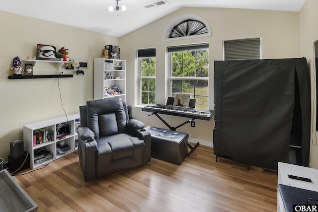 192 Colingwood Ln Lot 22, Kill Devil Hills, NC 27948 - sitting room with lofted ceiling and light wood-style flooring