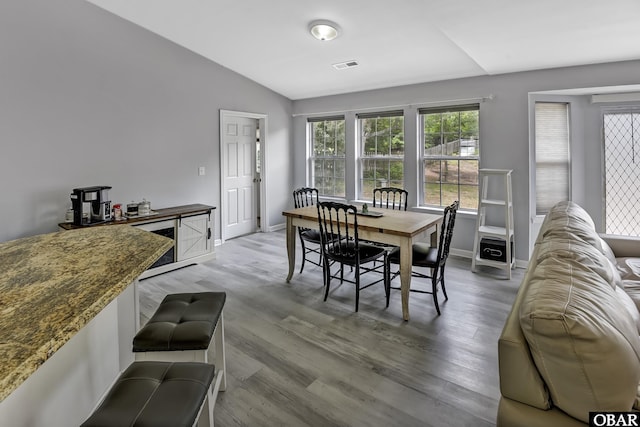 192 Colingwood Ln Lot 22, Kill Devil Hills, NC 27948 - dining area with lofted ceiling and light wood-style flooring