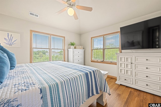 903 Windward Way Lot 15, Corolla, NC 27927 - bedroom with light wood finished floors, vaulted ceiling, a ceiling fan, and baseboards