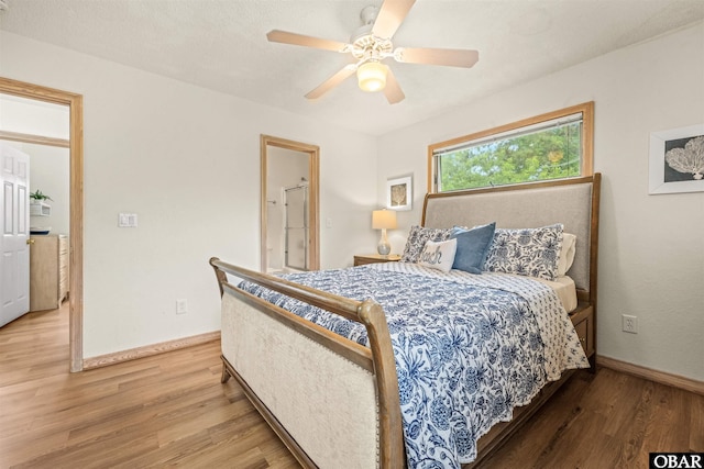 903 Windward Way Lot 15, Corolla, NC 27927 - bedroom featuring wood finished floors, baseboards, and ceiling fan
