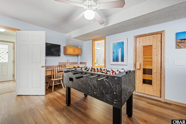 903 Windward Way Lot 15, Corolla, NC 27927 - game room featuring light wood-style flooring, a ceiling fan, and lofted ceiling