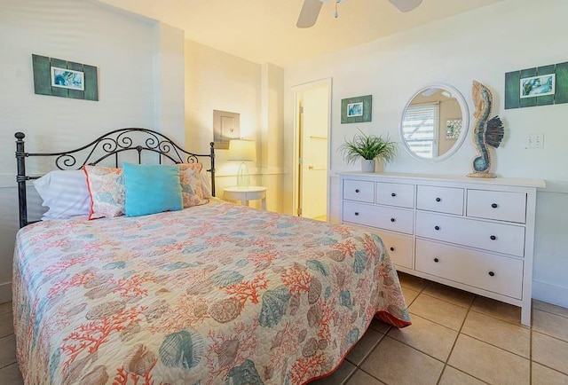 bedroom with tile patterned flooring and ceiling fan