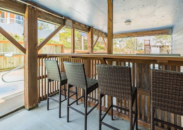 sunroom / solarium featuring a healthy amount of sunlight