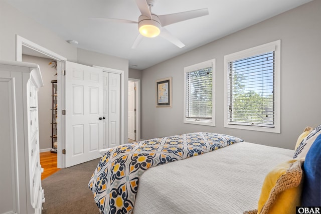 4311 S Hesperides Dr Lot # 55, Nags Head, NC 27959 - carpeted bedroom with a closet and a ceiling fan