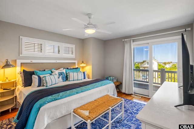 4311 S Hesperides Dr Lot # 55, Nags Head, NC 27959 - bedroom with access to outside, a ceiling fan, visible vents, and wood finished floors