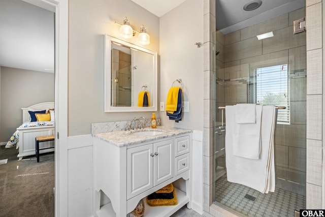 4311 S Hesperides Dr Lot # 55, Nags Head, NC 27959 - bathroom with vanity, wainscoting, and a shower stall