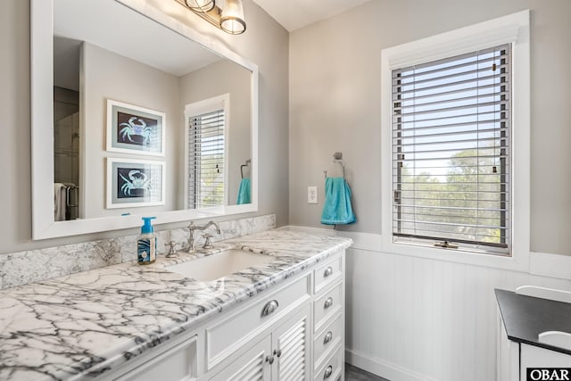 4311 S Hesperides Dr Lot # 55, Nags Head, NC 27959 - bathroom with wainscoting and vanity