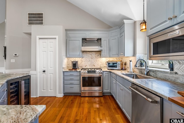4311 S Hesperides Dr Lot # 55, Nags Head, NC 27959 - kitchen featuring visible vents, premium range hood, gray cabinets, a sink, and appliances with stainless steel finishes