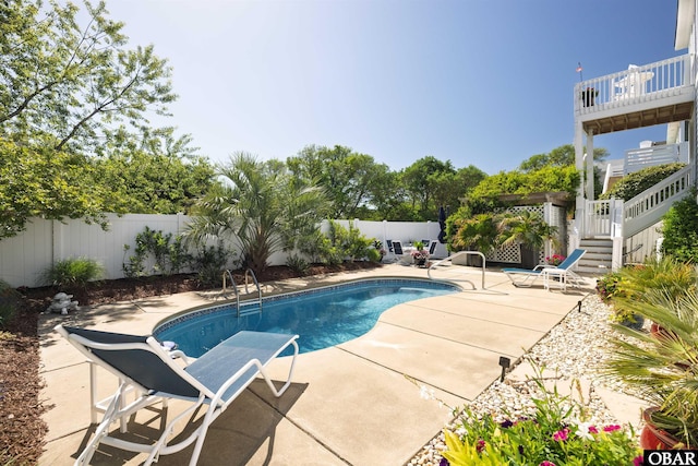 4311 S Hesperides Dr Lot # 55, Nags Head, NC 27959 - view of pool with a fenced in pool, a fenced backyard, a patio area, and stairs