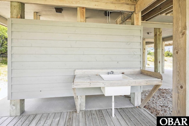 wooden terrace with a sink