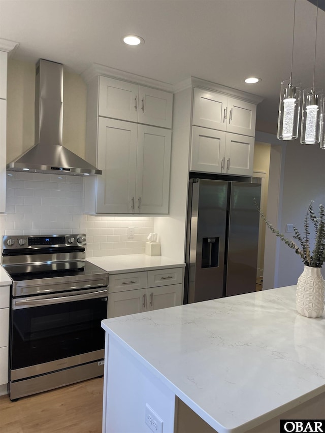 3009 Martins Point Rd Lot 3, Kitty Hawk, NC 27949 - kitchen with appliances with stainless steel finishes, wall chimney exhaust hood, recessed lighting, light wood-style flooring, and tasteful backsplash