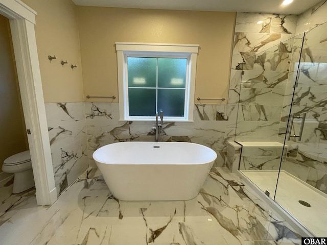 3009 Martins Point Rd Lot 3, Kitty Hawk, NC 27949 - full bathroom featuring a freestanding bath, a marble finish shower, toilet, marble finish floors, and tile walls