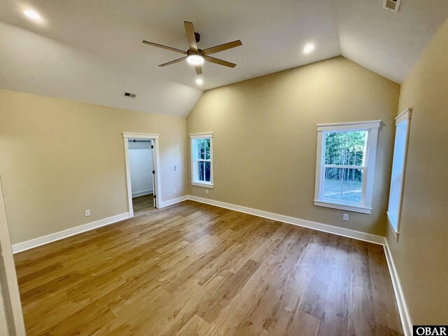 3009 Martins Point Rd Lot 3, Kitty Hawk, NC 27949 - empty room with ceiling fan, vaulted ceiling, wood finished floors, and baseboards