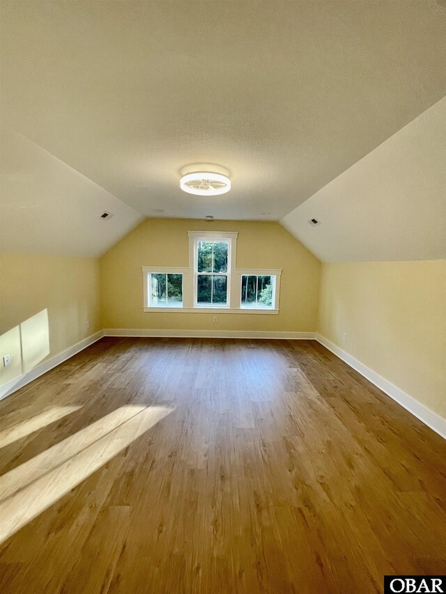 3009 Martins Point Rd Lot 3, Kitty Hawk, NC 27949 - bonus room with wood finished floors, vaulted ceiling, and baseboards