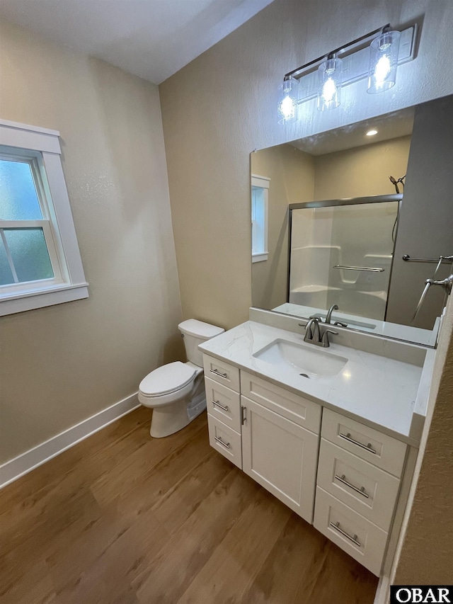 3009 Martins Point Rd Lot 3, Kitty Hawk, NC 27949 - full bath with wood finished floors, a shower, toilet, vanity, and baseboards