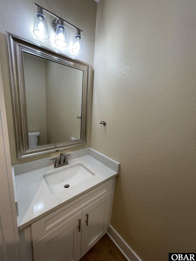 3009 Martins Point Rd Lot 3, Kitty Hawk, NC 27949 - half bath featuring vanity, toilet, and a textured wall