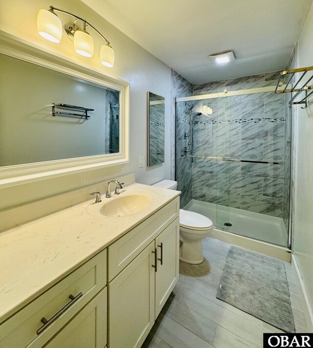 25 Croatan Ct Unit 25, Manteo, NC 27954 - full bathroom with vanity, toilet, and a shower stall