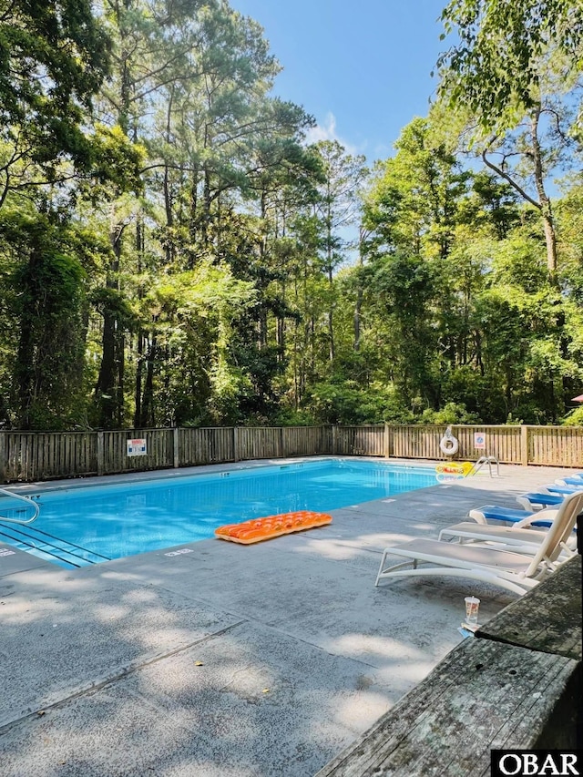 25 Croatan Ct Unit 25, Manteo, NC 27954 - community pool with a patio