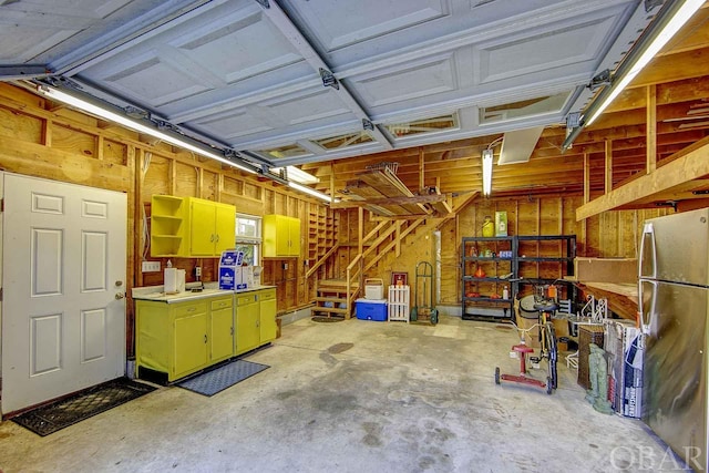 garage featuring freestanding refrigerator