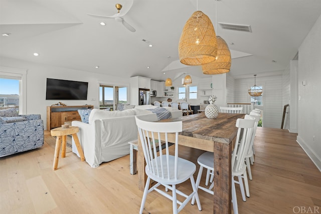 dining room with recessed lighting, a healthy amount of sunlight, visible vents, and light wood finished floors