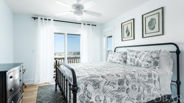 bedroom featuring access to exterior, ceiling fan, and light wood-style flooring