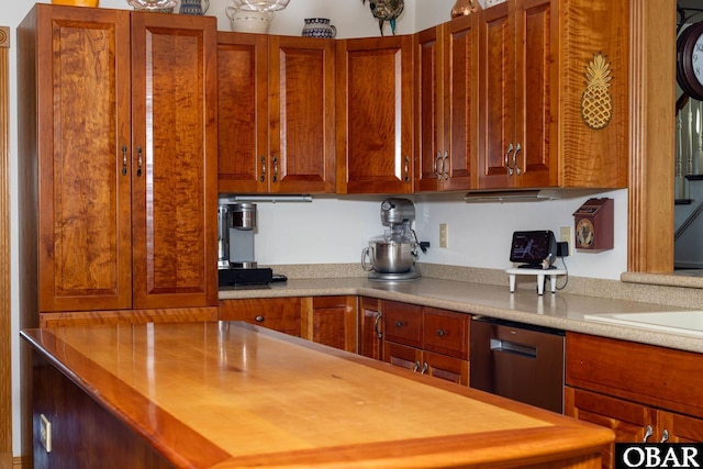 kitchen with brown cabinets and dishwasher