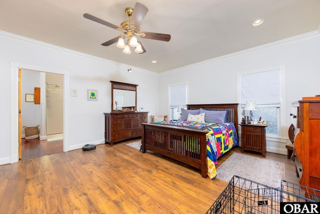 bedroom featuring baseboards, ceiling fan, wood finished floors, crown molding, and recessed lighting