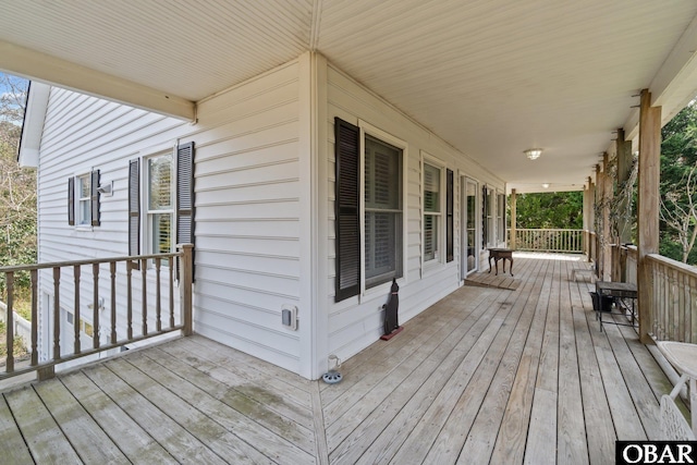 wooden deck featuring a porch