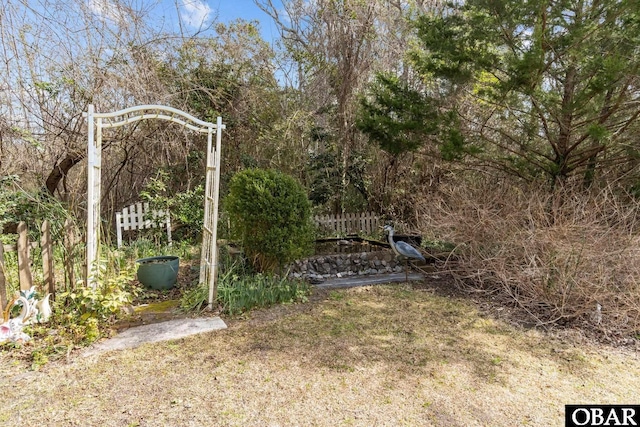 view of gate featuring fence