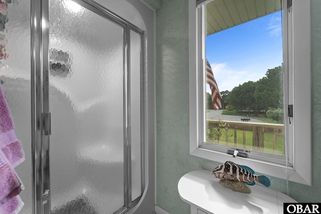 409 W Raceview Ct Lot # 35, Nags Head, NC 27959 - bathroom featuring a shower stall and a textured wall