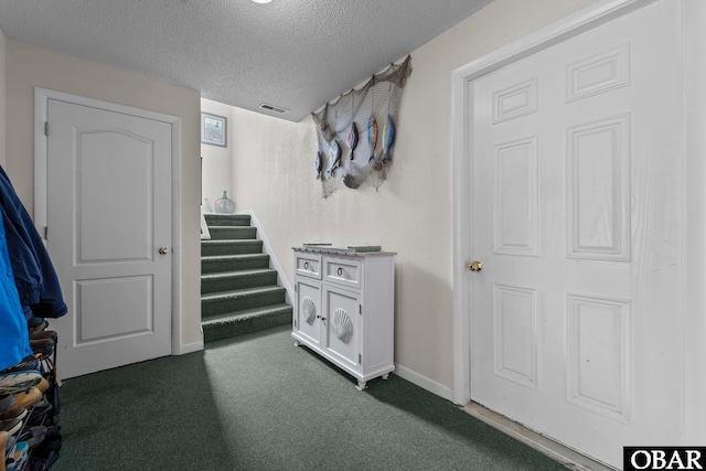 409 W Raceview Ct Lot # 35, Nags Head, NC 27959 - basement featuring dark colored carpet, a textured ceiling, and stairway