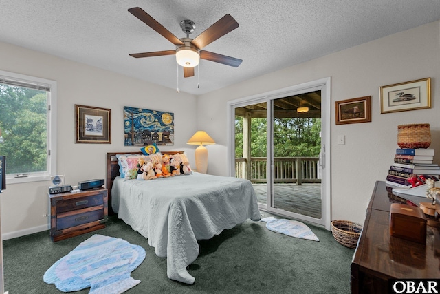 409 W Raceview Ct Lot # 35, Nags Head, NC 27959 - carpeted bedroom with access to exterior, a textured ceiling, and ceiling fan