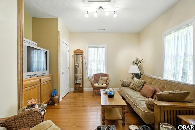 401 E Queen St, Edenton, NC 27932 - living area with light wood-style flooring and baseboards