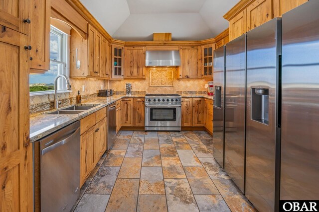 1459 Ocean Pearl Rd Lot 2, 3A, 3B, Corolla, NC 27927 - kitchen with stainless steel appliances, wall chimney range hood, stone tile floors, backsplash, and light stone countertops