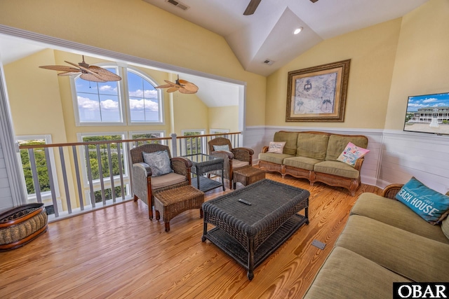 1459 Ocean Pearl Rd Lot 2, 3A, 3B, Corolla, NC 27927 - living room with a ceiling fan, vaulted ceiling, light wood finished floors, and a wainscoted wall