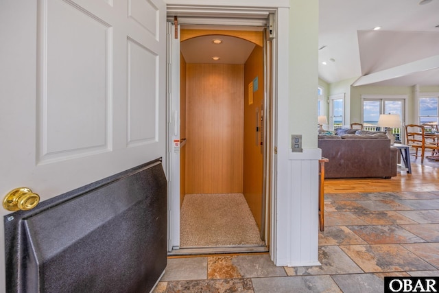 1459 Ocean Pearl Rd Lot 2, 3A, 3B, Corolla, NC 27927 - hall with elevator, arched walkways, and stone tile floors