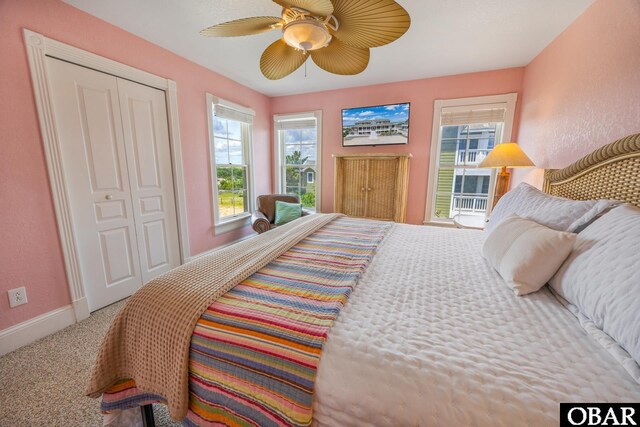 1459 Ocean Pearl Rd Lot 2, 3A, 3B, Corolla, NC 27927 - carpeted bedroom with multiple windows, a closet, and ceiling fan