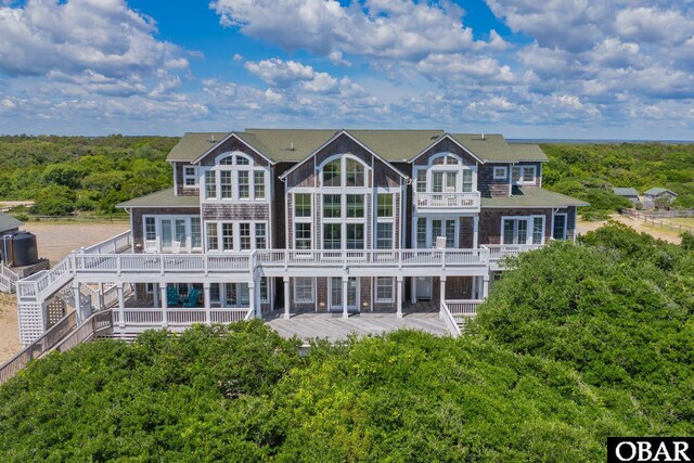 1459 Ocean Pearl Rd Lot 2, 3A, 3B, Corolla, NC 27927 - back of property with a deck and a forest view