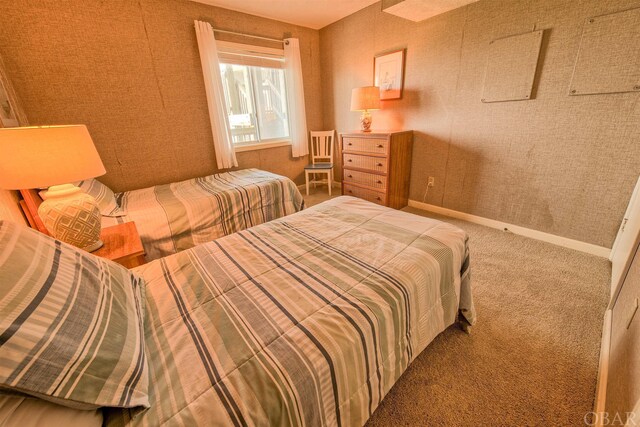 24256 Resort Rodanthe Dr Unit 6B, Rodanthe, NC 27968 - bedroom featuring baseboards and carpet flooring