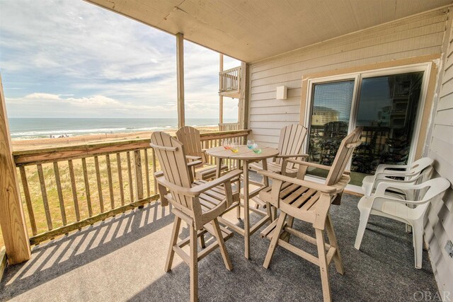 24256 Resort Rodanthe Dr Unit 6B, Rodanthe, NC 27968 - sunroom with a water view and a view of the beach