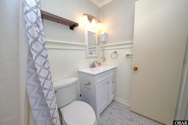 24256 Resort Rodanthe Dr Unit 6B, Rodanthe, NC 27968 - bathroom featuring toilet, tile patterned flooring, a shower with shower curtain, and vanity