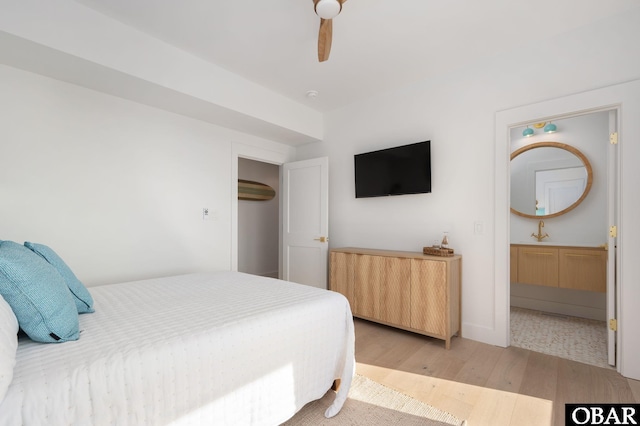 bedroom with light wood-type flooring and a ceiling fan