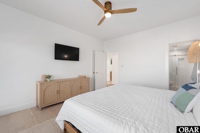 bedroom featuring light wood-style flooring, a ceiling fan, baseboards, and connected bathroom