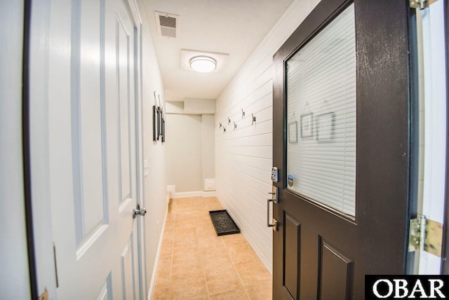 interior space with visible vents and light tile patterned flooring