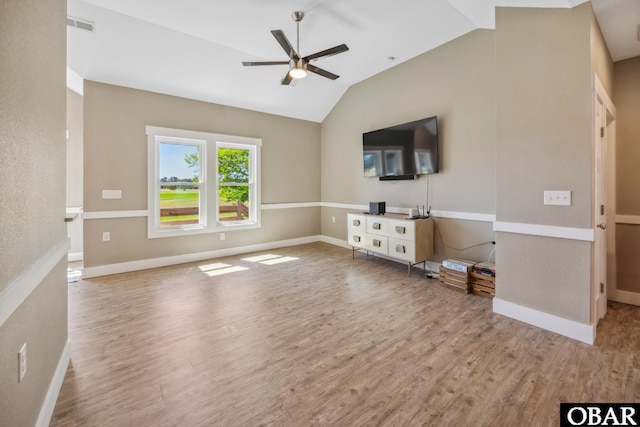 149 Carolina Club Dr Lot 54, Grandy, NC 27939 - unfurnished living room with ceiling fan, wood finished floors, and lofted ceiling