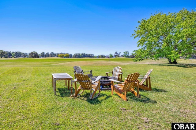 149 Carolina Club Dr Lot 54, Grandy, NC 27939 - view of green lawn featuring a fire pit and view of golf course