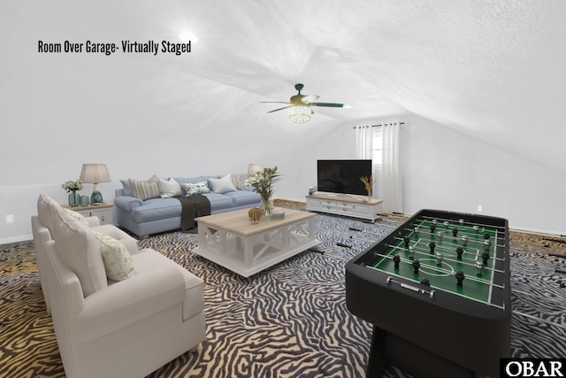149 Carolina Club Dr Lot 54, Grandy, NC 27939 - living area featuring lofted ceiling, carpet floors, and a ceiling fan