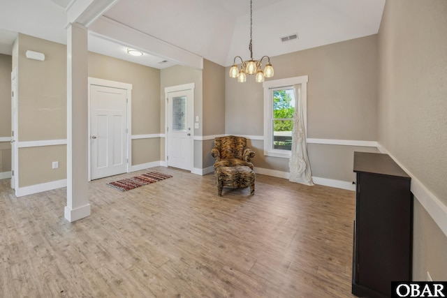 149 Carolina Club Dr Lot 54, Grandy, NC 27939 - sitting room featuring wood finished floors, a chandelier, and vaulted ceiling