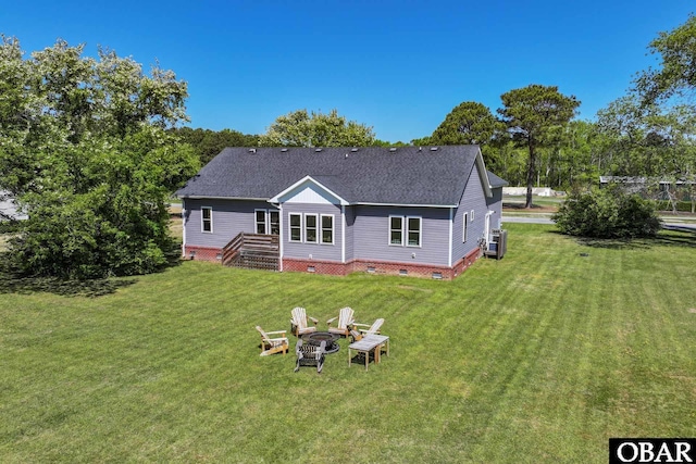 149 Carolina Club Dr Lot 54, Grandy, NC 27939 - rear view of property with crawl space, a yard, roof with shingles, and an outdoor fire pit