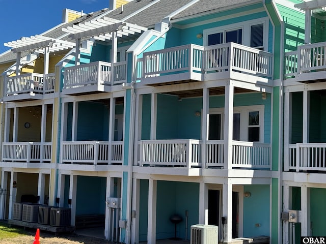 view of building exterior featuring central AC unit